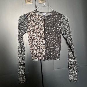 Semi cropped mesh long sleeve shirt.